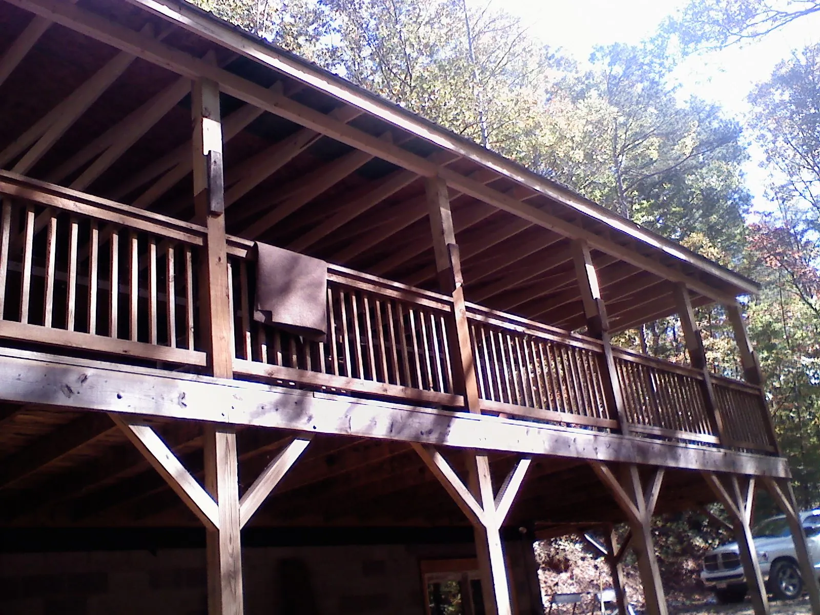 Timber framing under a new elevated porch and deck — Roof Leak Repair in Spicewood by Roofing Brothers